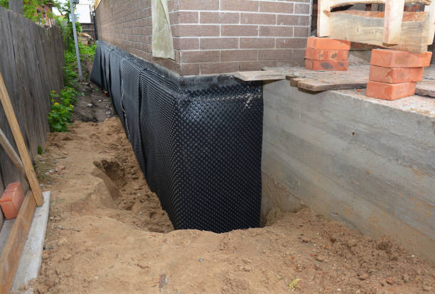Happy homeowners after waterproofing job in Smiths Station